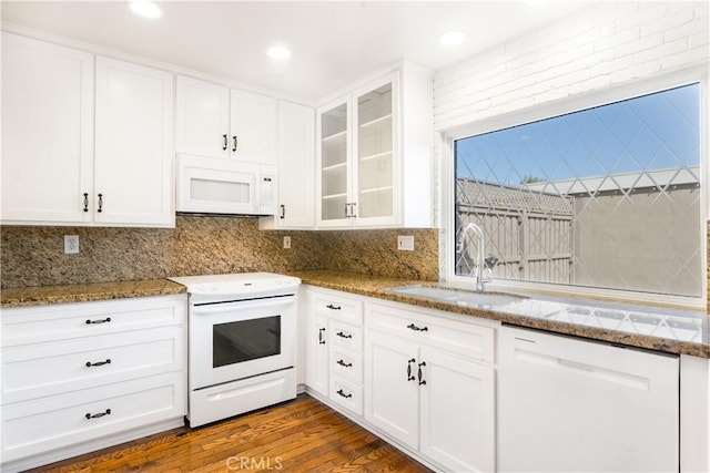 7200 Newton Way, Stanton, CA 90680 - kitchen featuring white cabinetry, a sink, and white appliances