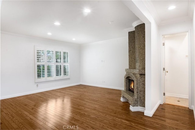 7200 Newton Way, Stanton, CA 90680 - unfurnished living room with crown molding, baseboards, wood finished floors, and a fireplace