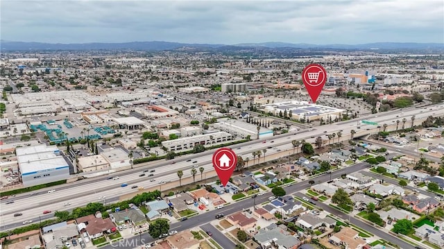 bird's eye view featuring a city view and a mountain view