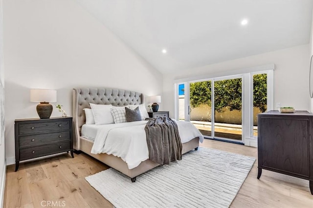 27553 Via Fortuna, San Juan Capistrano, CA 92675 - bedroom featuring light wood-type flooring, vaulted ceiling, recessed lighting, and access to exterior