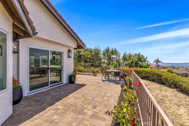 27553 Via Fortuna, San Juan Capistrano, CA 92675 - view of patio / terrace featuring outdoor dining area and fence