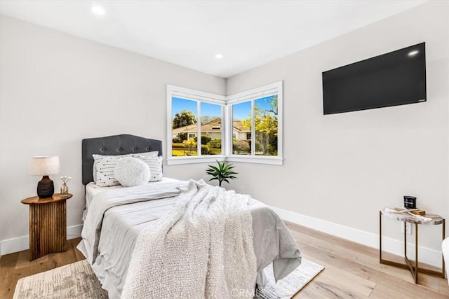 27553 Via Fortuna, San Juan Capistrano, CA 92675 - bedroom with wood finished floors, baseboards, and recessed lighting