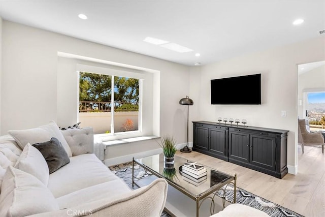 27553 Via Fortuna, San Juan Capistrano, CA 92675 - living area with recessed lighting, visible vents, light wood finished floors, and baseboards
