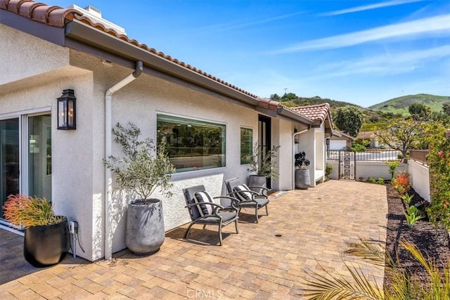 27553 Via Fortuna, San Juan Capistrano, CA 92675 - view of patio featuring fence and a mountain view