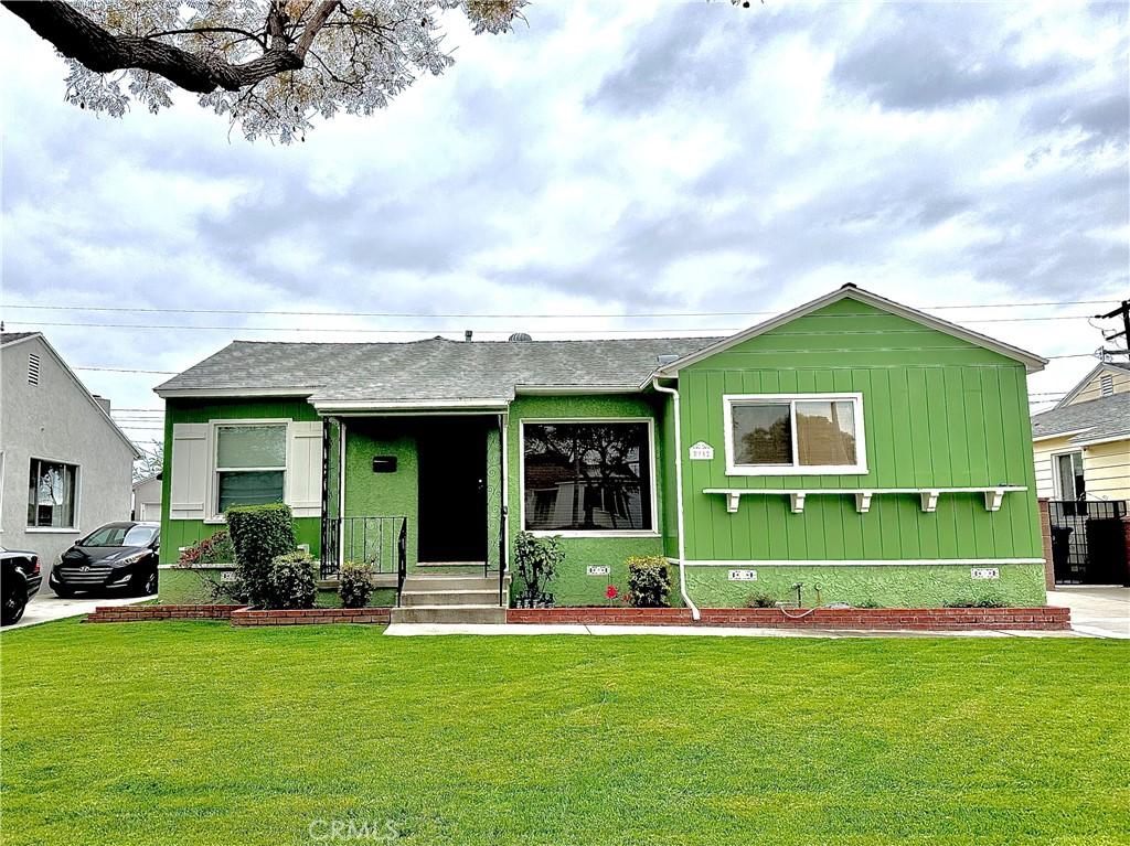 2712 Warwood Rd, Lakewood, CA 90712 - view of front of home with crawl space, a front lawn, and roof with shingles