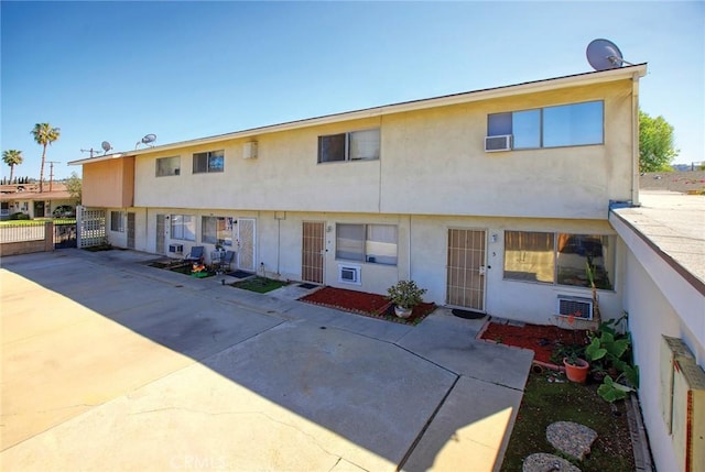 673 S Eremland Dr, Covina, CA 91723 - view of front of home featuring stucco siding and fence