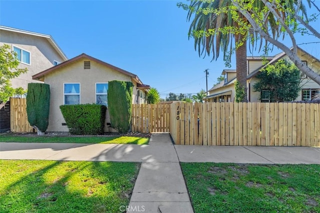 180 S 2nd Ave, Upland, CA 91786 - view of front of house featuring stucco siding