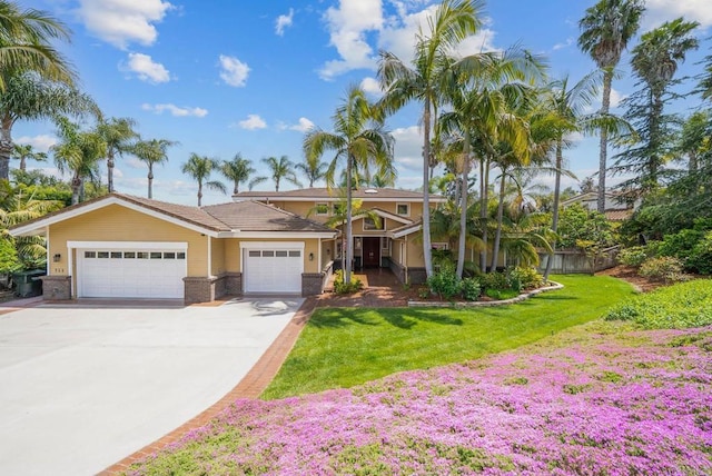 753 Jacquelene Ct, Encinitas, CA 92024 - view of front of home featuring brick siding, a garage, driveway, and a front lawn