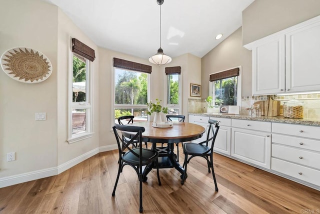 753 Jacquelene Ct, Encinitas, CA 92024 - dining area with light wood finished floors, baseboards, and vaulted ceiling