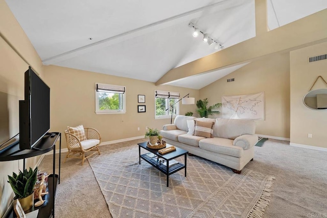753 Jacquelene Ct, Encinitas, CA 92024 - carpeted living room with vaulted ceiling, baseboards, and rail lighting