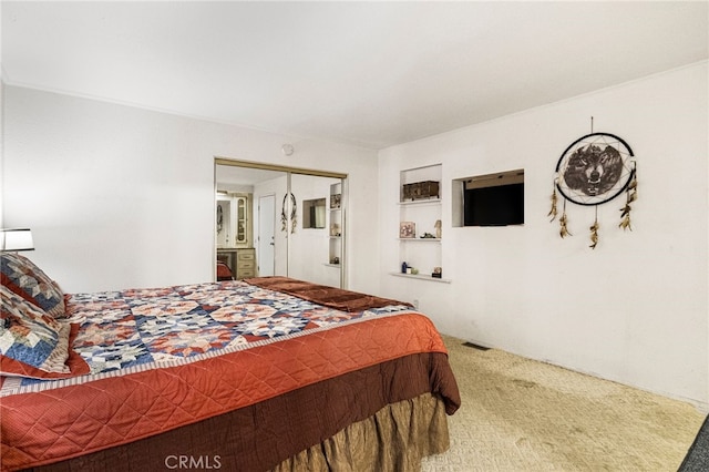 bedroom with carpet and visible vents