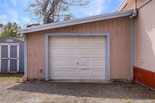 garage with a storage shed