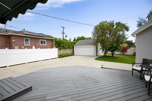 1430 Irving Ave, Glendale, CA 91201 - deck featuring a yard, a patio area, a garage, a fenced backyard, and an outdoor structure