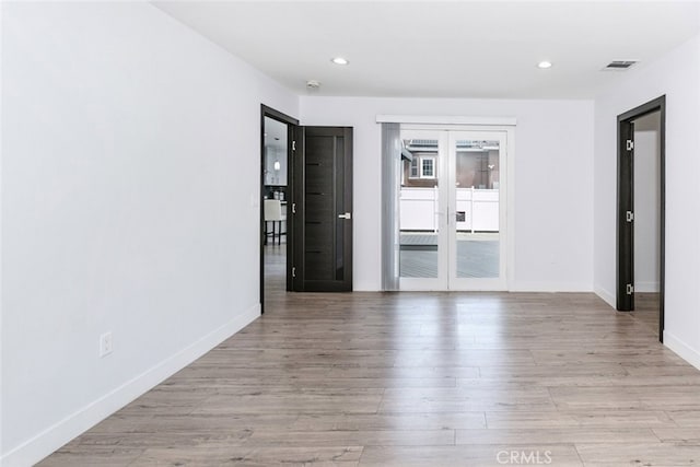 1430 Irving Ave, Glendale, CA 91201 - spare room featuring visible vents, recessed lighting, french doors, light wood finished floors, and baseboards