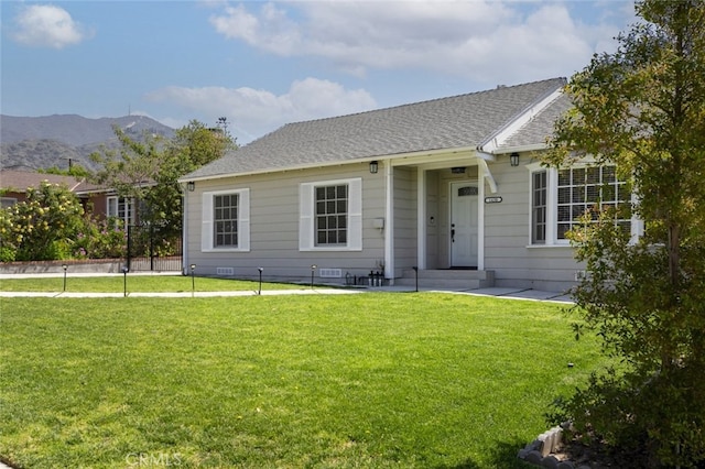 1430 Irving Ave, Glendale, CA 91201 - ranch-style house featuring a front yard, a mountain view, and a shingled roof