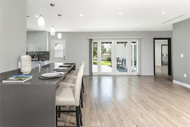 1430 Irving Ave, Glendale, CA 91201 - kitchen featuring hanging light fixtures, baseboards, recessed lighting, and light wood-style floors