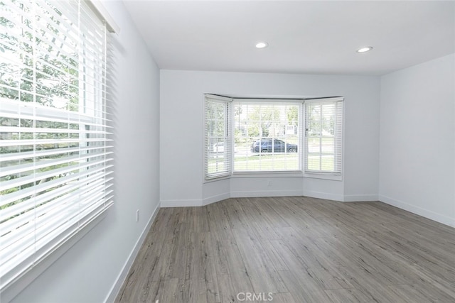 1430 Irving Ave, Glendale, CA 91201 - spare room featuring recessed lighting, baseboards, and wood finished floors
