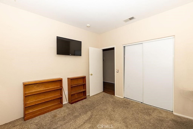 43564 Amazon St, Hemet, CA 92544 - unfurnished bedroom featuring carpet and a closet