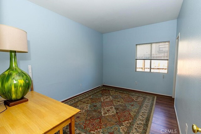 43564 Amazon St, Hemet, CA 92544 - spare room with wood finished floors and baseboards