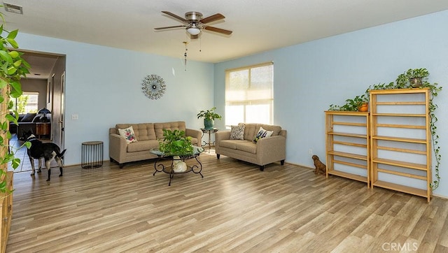 43564 Amazon St, Hemet, CA 92544 - living area featuring light wood-style flooring and ceiling fan
