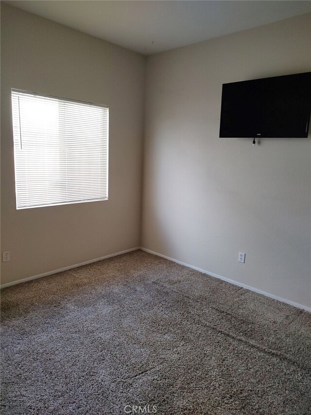 43564 Amazon St, Hemet, CA 92544 - carpeted empty room featuring baseboards