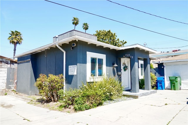 view of front of property with a garage and driveway
