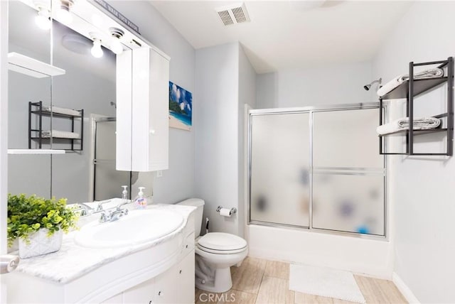1180 Civic Center Dr Unit B21, Oceanside, CA 92054 - full bath featuring vanity, toilet, and combined bath / shower with glass door
