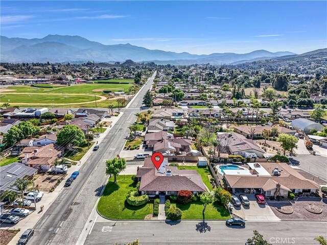 drone / aerial view featuring a mountain view and a residential view