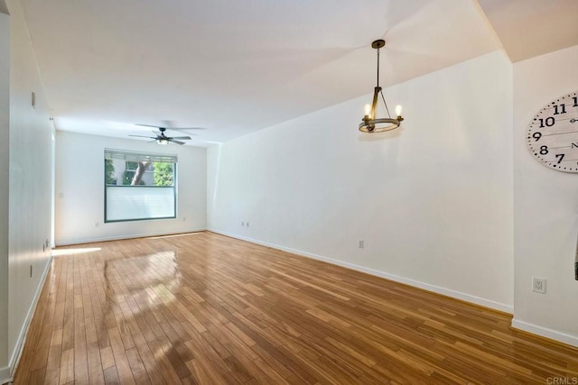 1150 J St Unit 117, San Diego, CA 92101 - spare room with hardwood / wood-style flooring, baseboards, and a ceiling fan