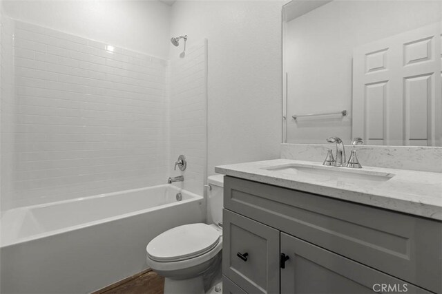 4265 S Hermosa Paseo, Ontario, CA 91761 - full bathroom with toilet, vanity, wood finished floors, and tub / shower combination