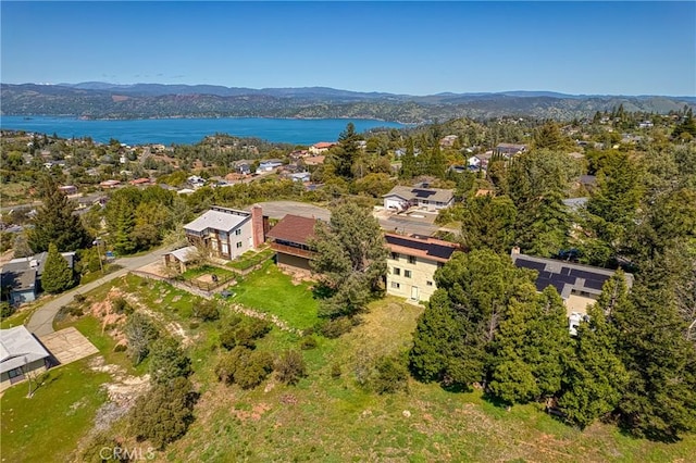 bird's eye view featuring a water and mountain view