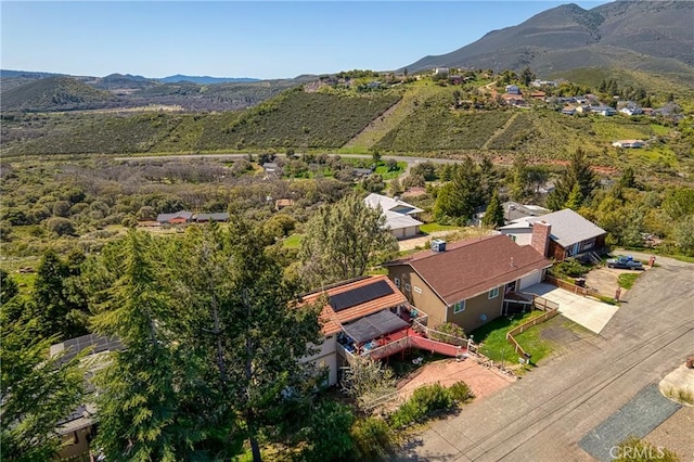 bird's eye view with a mountain view
