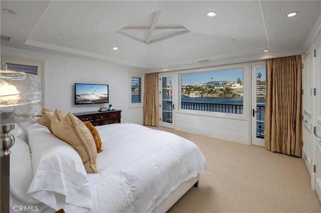 2258 Channel Rd, Newport Beach, CA 92661 - bedroom with a tray ceiling, recessed lighting, light carpet, and access to outside