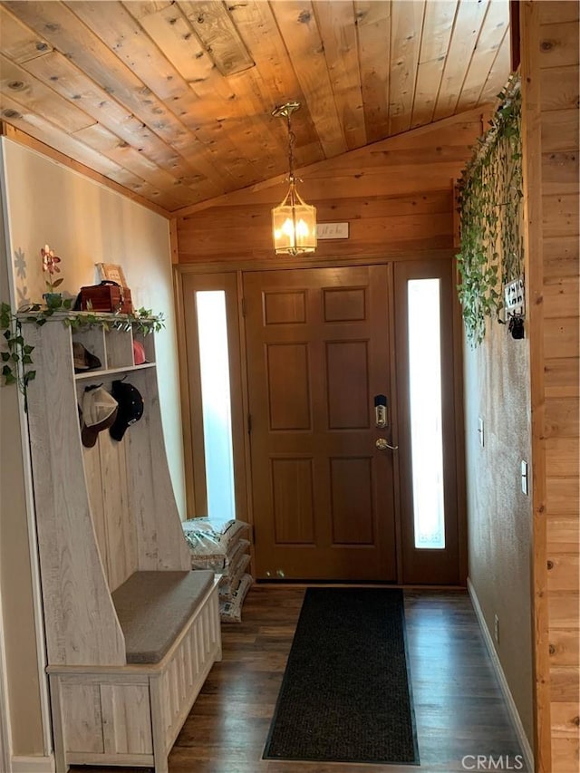 foyer entrance featuring plenty of natural light, wooden ceiling, dark wood-style floors, and vaulted ceiling