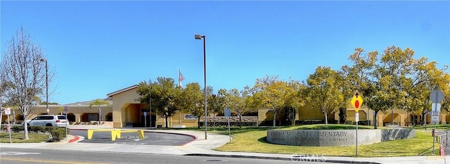 view of community with a yard