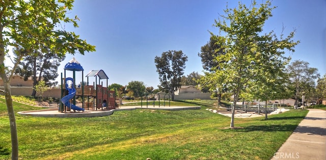 community play area with a yard