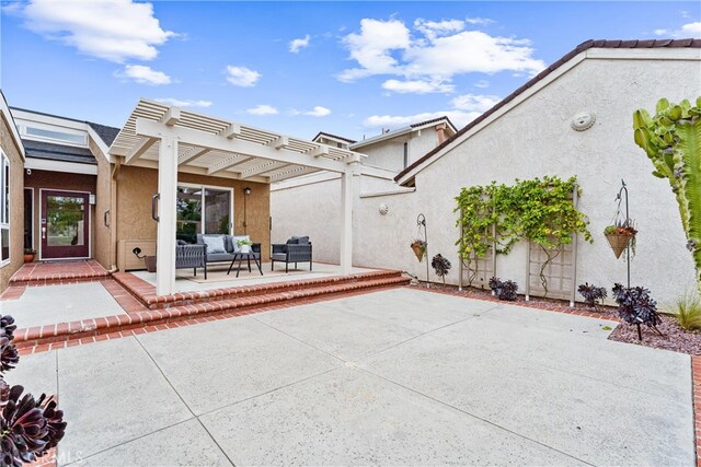 view of patio featuring a pergola and outdoor lounge area