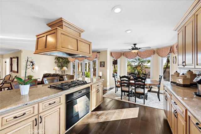 kitchen featuring recessed lighting, gas stovetop, ceiling fan, black oven, and dark wood finished floors