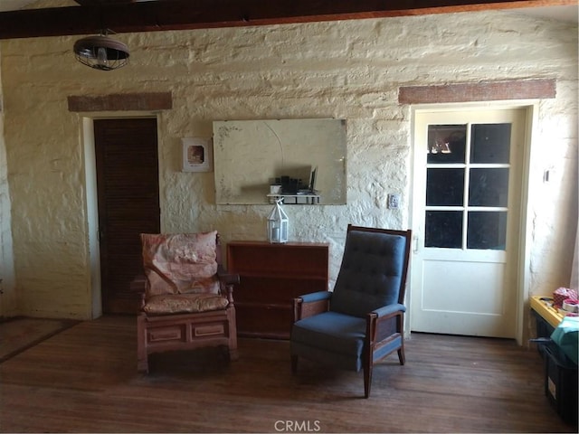 living area with wood finished floors