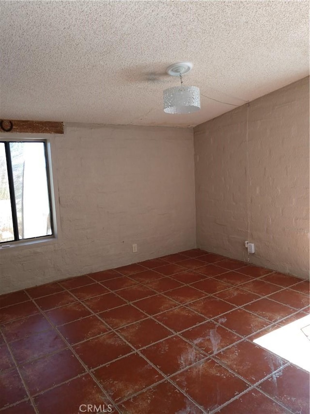 view of tiled spare room