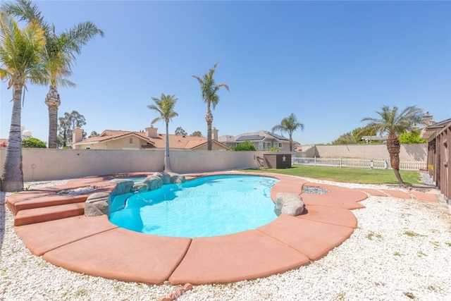 view of swimming pool featuring a fenced backyard and a fenced in pool