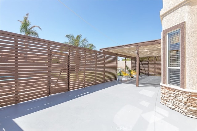 view of patio with a pergola
