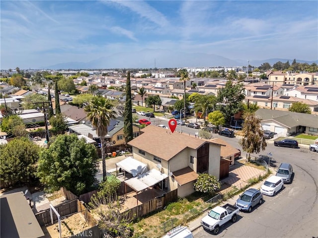 aerial view featuring a mountain view and a residential view