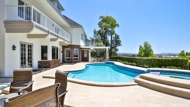 25782 Highplains Ter, Laguna Hills, CA 92653 - view of pool with a patio, french doors, and a pool with connected hot tub