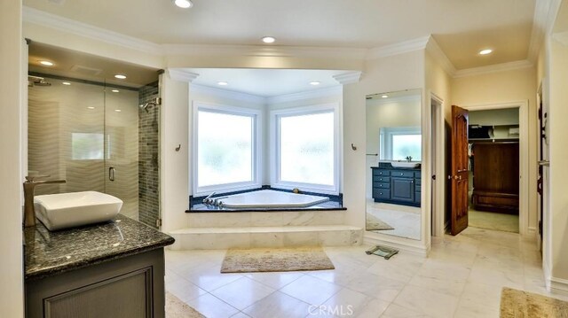 25782 Highplains Ter, Laguna Hills, CA 92653 - bathroom featuring vanity, ornamental molding, a shower stall, a bath, and recessed lighting