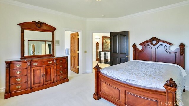 25782 Highplains Ter, Laguna Hills, CA 92653 - bedroom with crown molding, light colored carpet, and baseboards