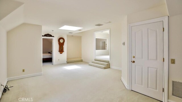 25782 Highplains Ter, Laguna Hills, CA 92653 - additional living space featuring light carpet, baseboards, and a skylight