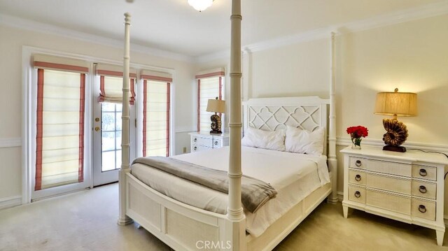 25782 Highplains Ter, Laguna Hills, CA 92653 - bedroom featuring light colored carpet, access to exterior, and crown molding