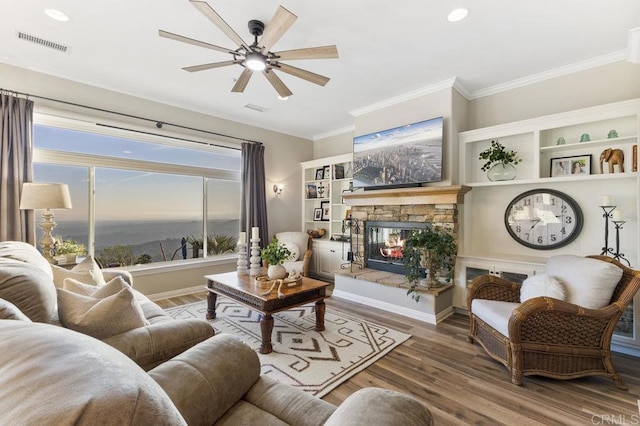 1078 Rainbow Crest Rd, Fallbrook, CA 92028 - living room with wood finished floors, a fireplace, crown molding, ceiling fan, and recessed lighting