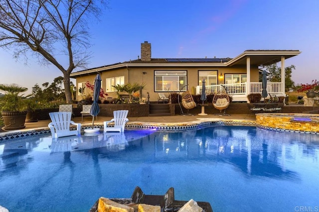 1078 Rainbow Crest Rd, Fallbrook, CA 92028 - pool at dusk with an outdoor pool, a wooden deck, and a patio
